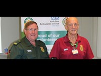 Lee Whitworth, Community Defibrillation Trainer presenting Chris Wilson with his award during Volunteers’ Week