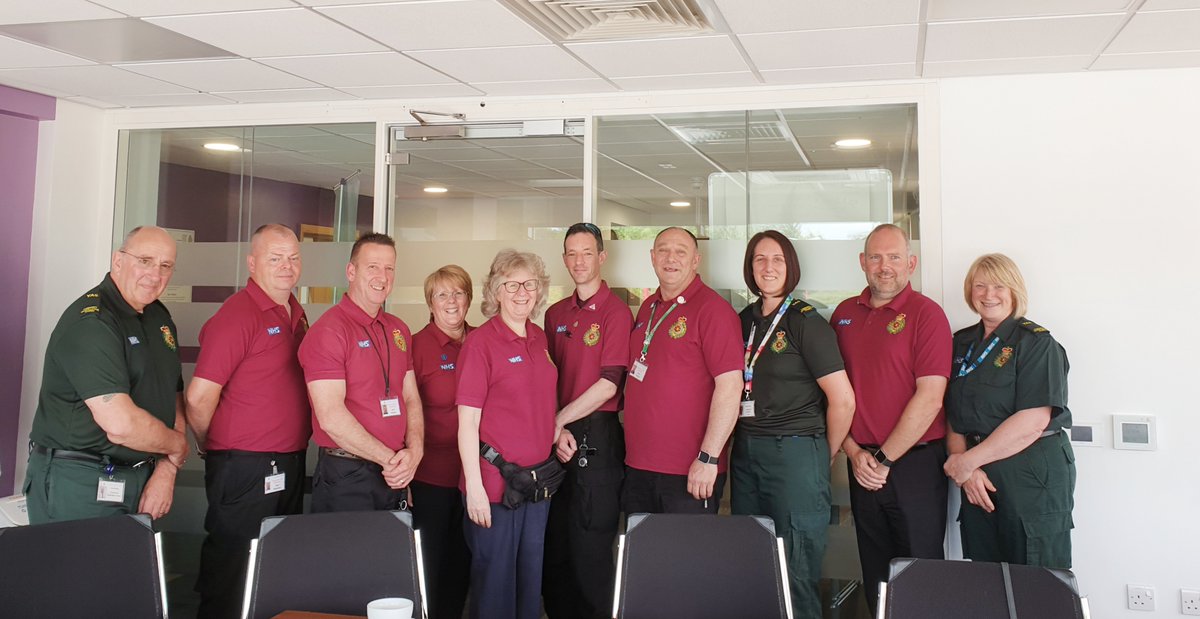 A group of volunteers celebrating at Yorkshire Ambulance Service HQ