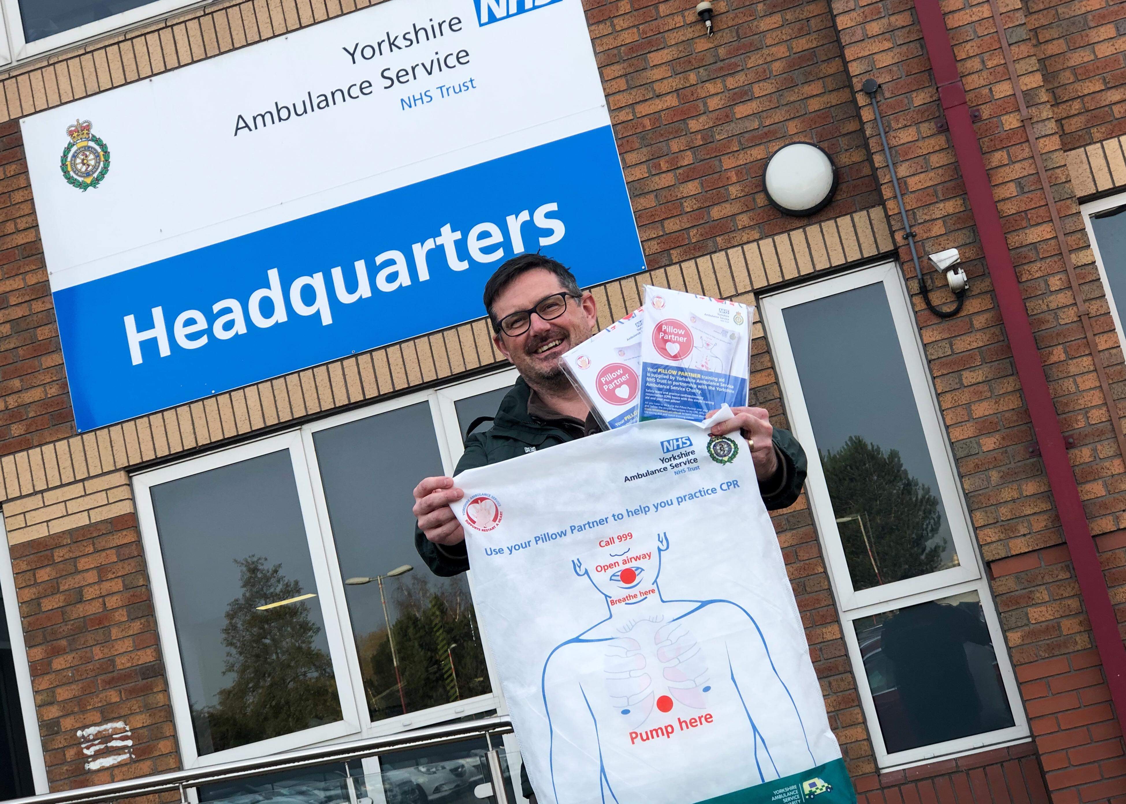 Community Engagement Manager Jason Carlyon with the new Pillow Partner CPR training aids