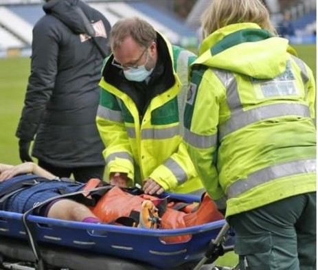 Medical commander treating a patient