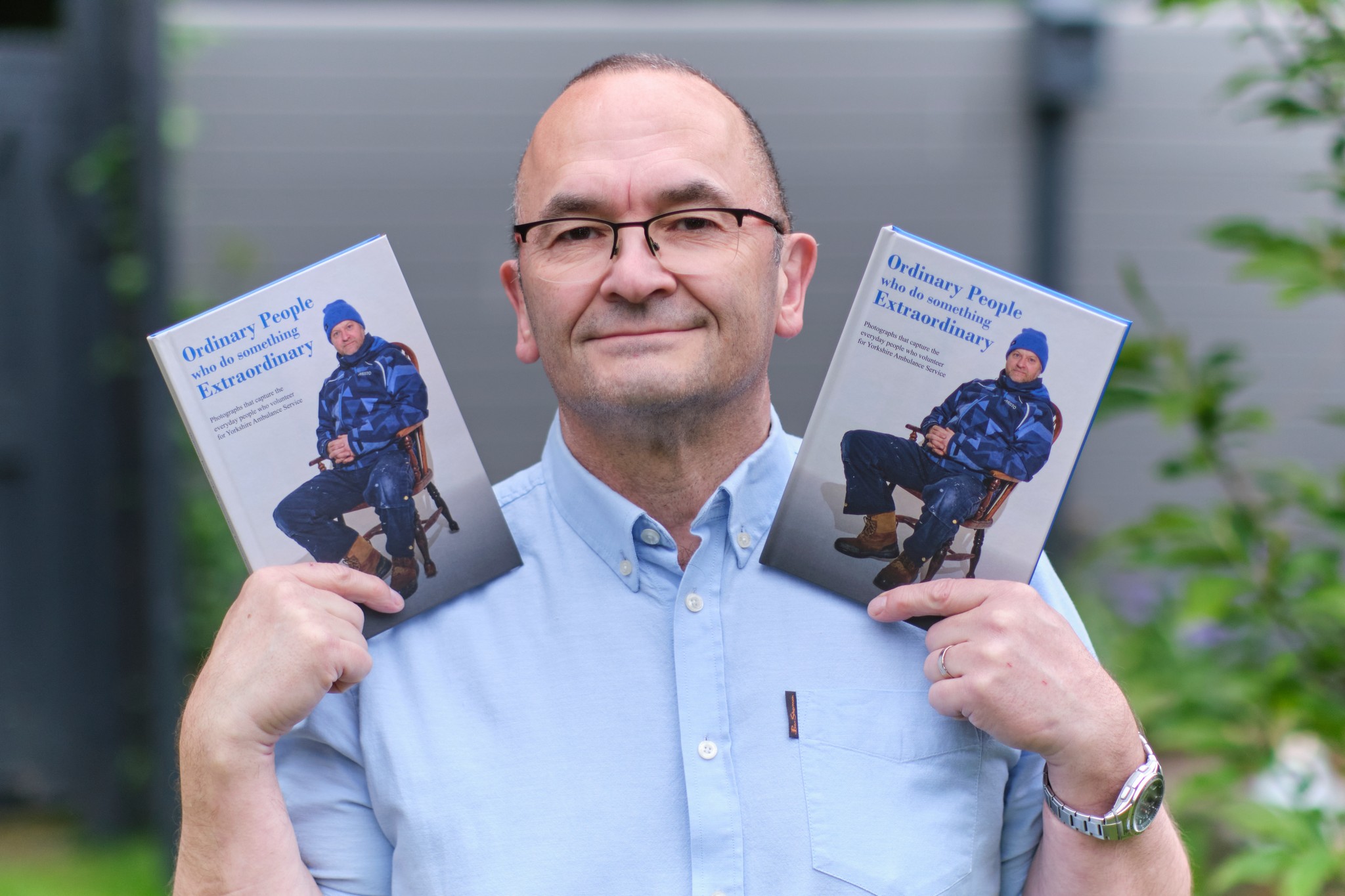 Photographer Rick Corbishley with his book