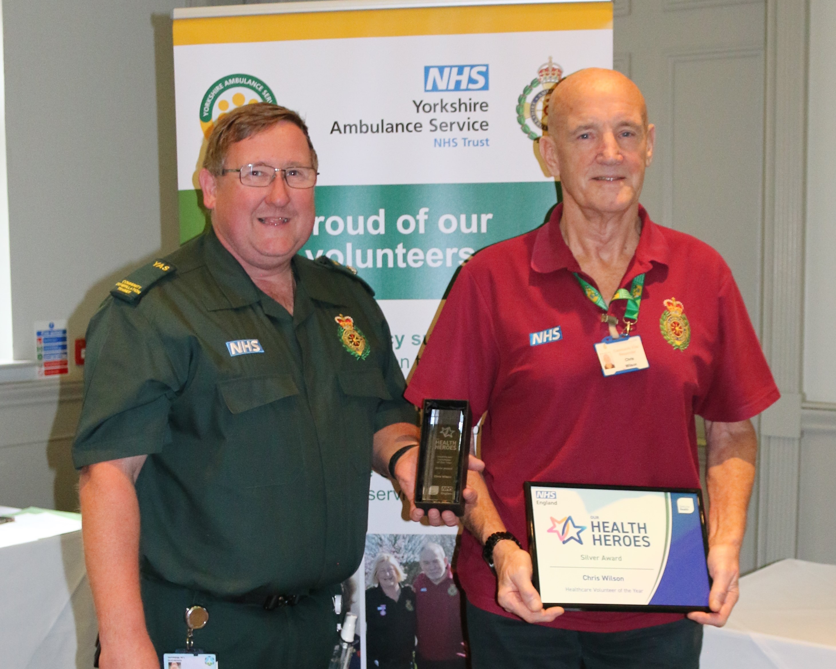 Lee Whitworth, Community Defibrillation Trainer presenting Chris Wilson with his award during Volunteers’ Week