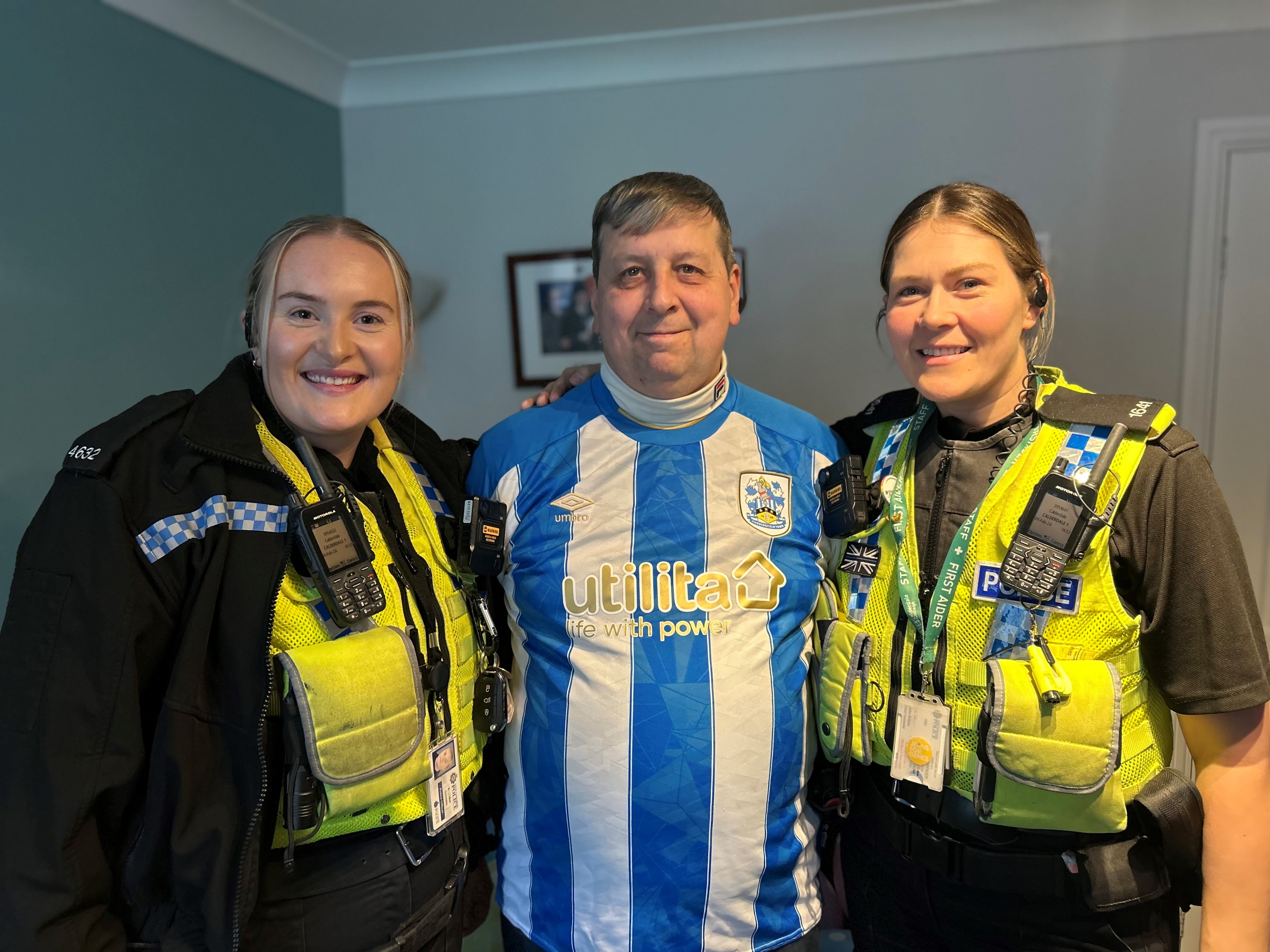 Allan Lamb with his life-savers, PC Emily Bell and PC Steph Robinson