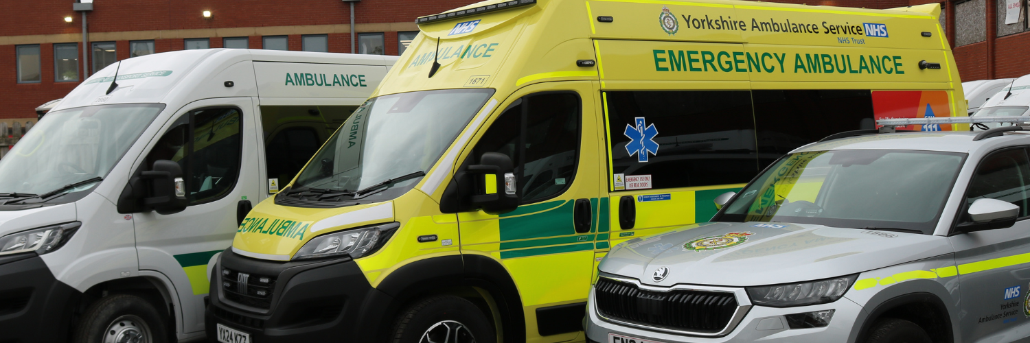 Ambulances parked up in a line